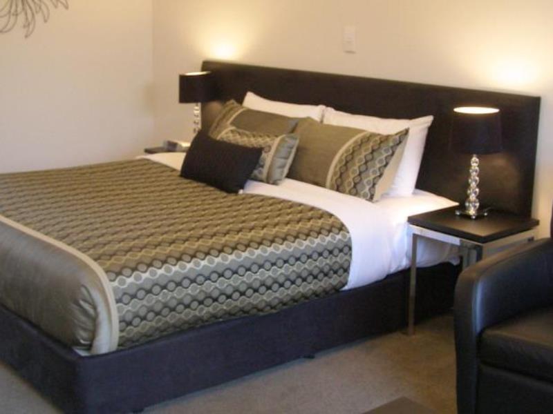 Bellano Motel Suites Christchurch Ngoại thất bức ảnh A bed